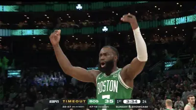 Jaylen Brown hyping up the crowd during a Warriors-Celtics game