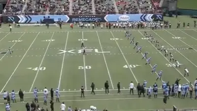 XFL players line up for a kickoff