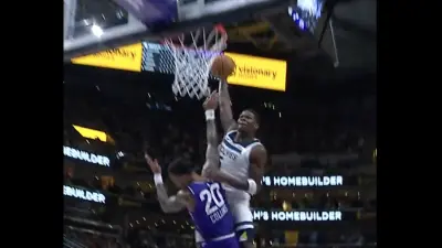 Timberwolves star Anthony Edwards dunks over John Collins