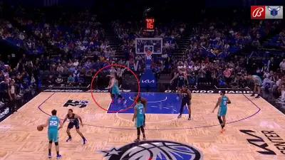 Davis Bertans throws an elbow
