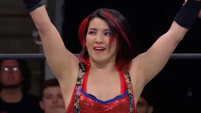 Hikaru Shida raises her arms