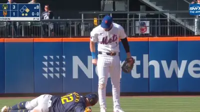 Jeff McNeil barks at a runner
