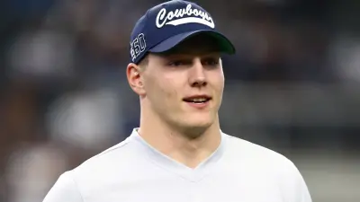 Leighton Vander Esch looks on