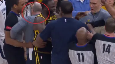 Taylor Jenkins and Draymond Green getting tangled up