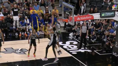Trayce Jackson-Davis dunks on Victor Wembanyama