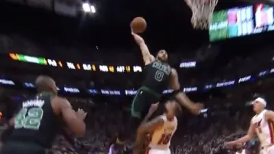 Jayson Tatum dunks on Caleb Martin