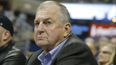Jim Calhoun looks on