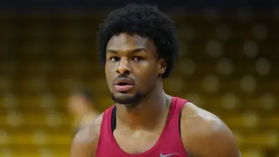 Bronny James in a red tank top