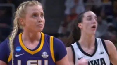 Hailey Van Lith looks at Caitlin Clark