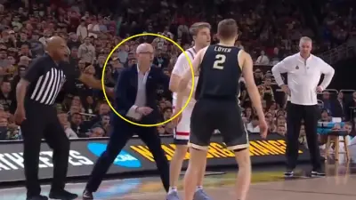 Dan Hurley pushing a player