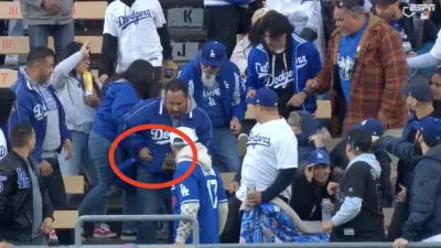 Dodgers fan catches Manny Machado's home run ball