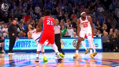 Joel Embiid pushes Jalen Brunson