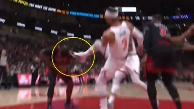 Josh Hart kicking Javonte Green