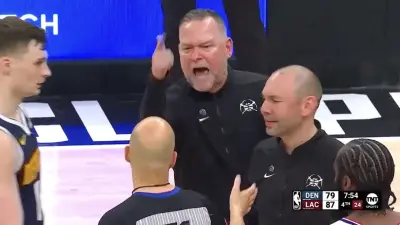 Michael Malone cussing out NBA referee Aaron Smith during a Clippers-Nuggets game