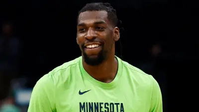 Naz Reid smiling