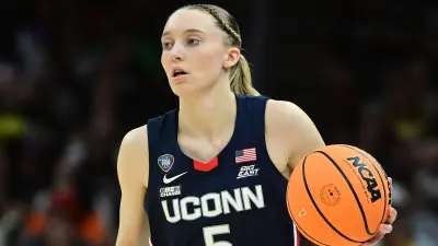 Paige Bueckers holds the ball