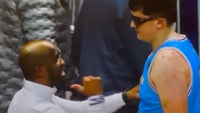 Shaheen Holloway shakes Robbie Avila hand