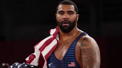 Gable Steveson holds the American flag
