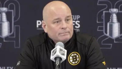 Jim Montgomery at a press conference