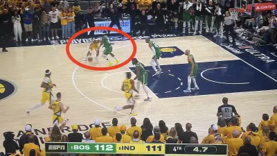 Andrew Nembard driving against Jrue Holiday in Game 3 of Pacers-Celtics