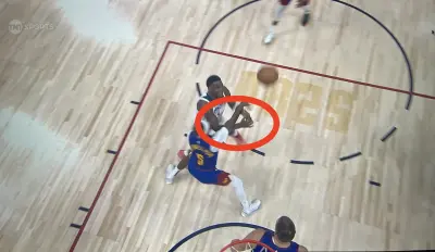 Timberwolves star Anthony Edwards getting fouled by Nuggets guard Kentavious Caldwell-Pope