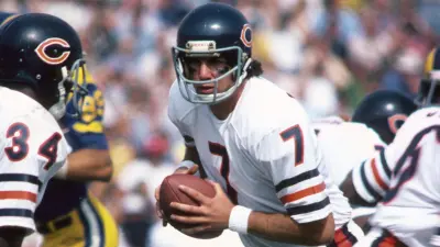 Former Chicago Bears QB Bob Avellini holding a football