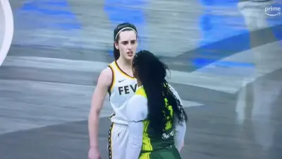 Caitlin Clark and Victoria Vivians having a staredown during a Fever-Storm game