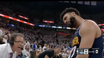 Nuggets star Jamal Murray staring at Kevin Harlan.