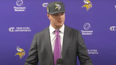 JJ McCarthy talks with the media