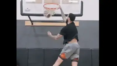 Lonzo Ball dunking a ball