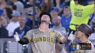 Padres centerfielder Jackson Merrill looking to the heavens