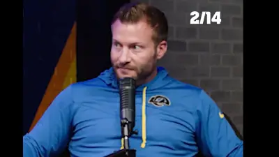 Sean McVay in front of a microphone
