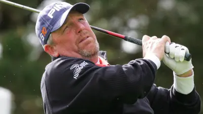 Mark Calcavecchia poses after a shot