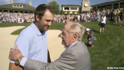 Scottie Scheffler shakes hands with Jack Nicklaus
