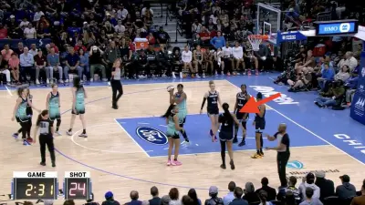 Angel Reese waving off WNBA referee Charles Watson