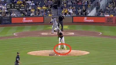 Pirates pitcher Aroldis Chapman throwing his glove to the mound