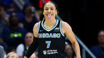 Chennedy Carter with her tongue out