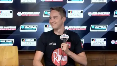 Christopher Bell smiling at a press conference