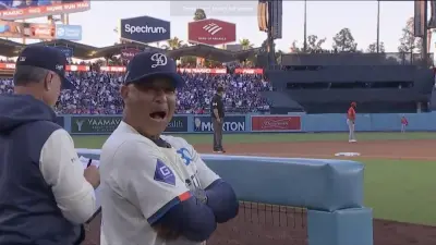 Dodgers manager Dave Roberts with his mouth agape after a Shohei Ohtani home run