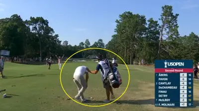 Francesco Molinari slumped over