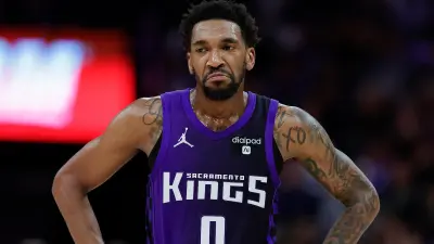 Malik Monk in a Kings uniform