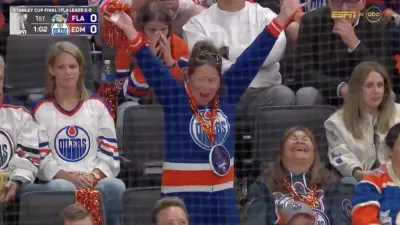 Oilers fan celebrating