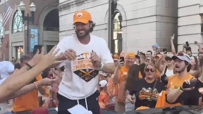 Tennessee baseball head coach Tony Vitello celebrates at championship parade