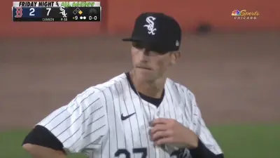 White Sox outfielder Duke Ellis holding his jersey