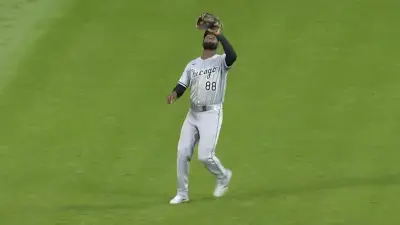Luis Robert catches a fly ball