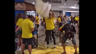 Fans throwing around popcorn