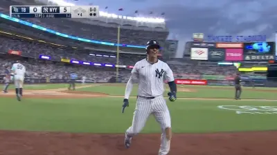 Yankees star Juan Soto smiling after scoring a Little League home run