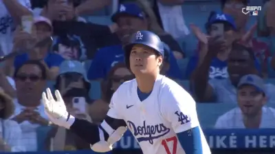 Dodgers star Shohei Ohtani flips his bat after hitting a home run