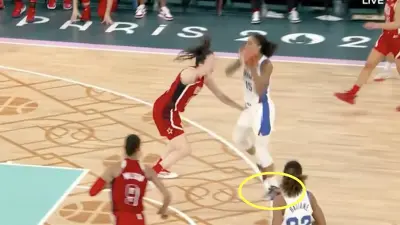 Gabby Williams puts up a buzzer-beater shot