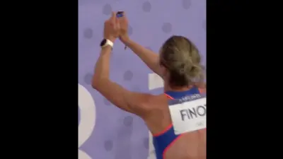 Alice Finot holds up a pin